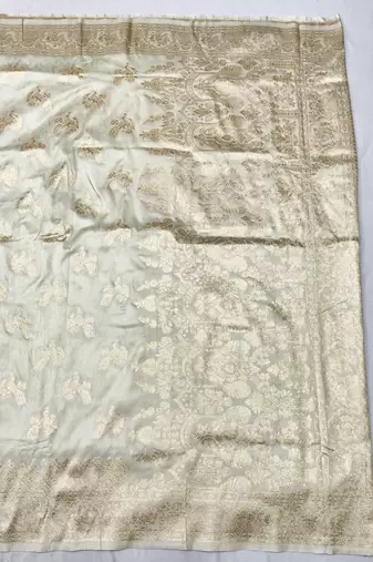 Cream zari woven banarasi silk traditional saree with blouse piece