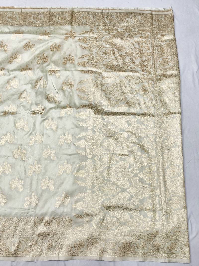 Cream zari woven banarasi silk traditional saree with blouse piece