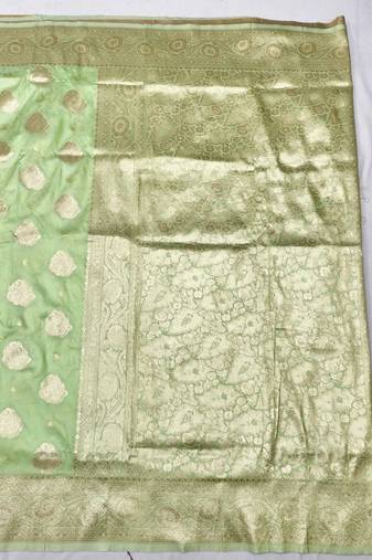 Light green zari woven banarasi silk traditional saree with blouse piece