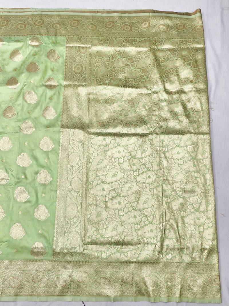 Light green zari woven banarasi silk traditional saree with blouse piece