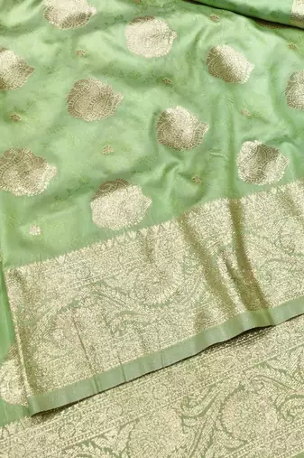 Light green zari woven banarasi silk traditional saree with blouse piece