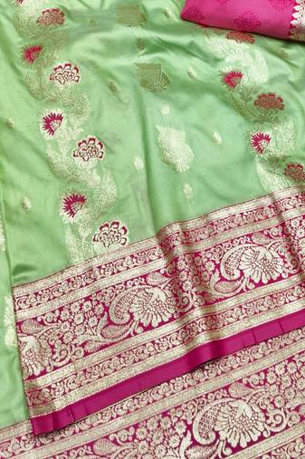 Light green zari woven banarasi silk traditional saree with blouse piece