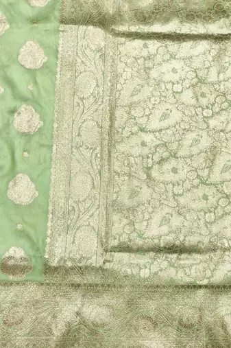 Light green zari woven banarasi silk traditional saree with blouse piece