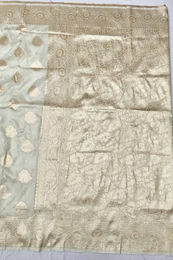 Cream zari woven banarasi silk traditional saree with blouse piece