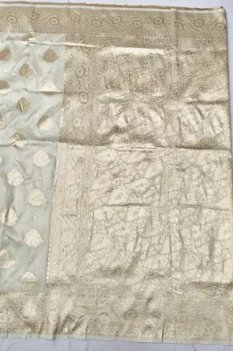 Cream zari woven banarasi silk traditional saree with blouse piece