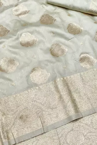 Cream zari woven banarasi silk traditional saree with blouse piece