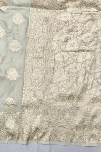 Cream zari woven banarasi silk traditional saree with blouse piece