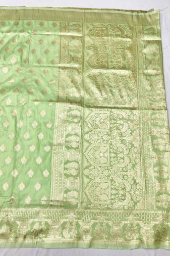 Light green zari woven banarasi silk traditional saree with blouse piece