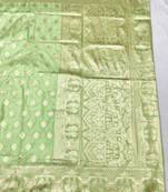 Light green zari woven banarasi silk traditional saree with blouse piece