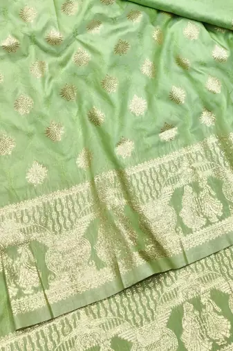 Light green zari woven banarasi silk traditional saree with blouse piece