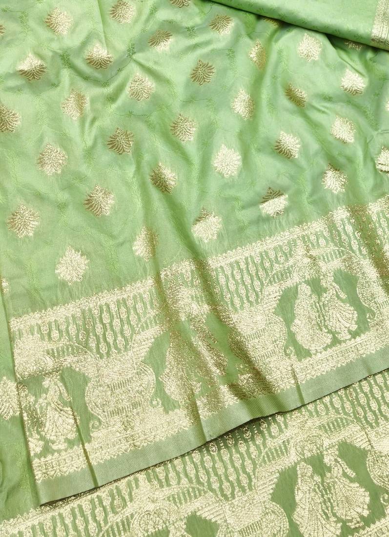 Light green zari woven banarasi silk traditional saree with blouse piece
