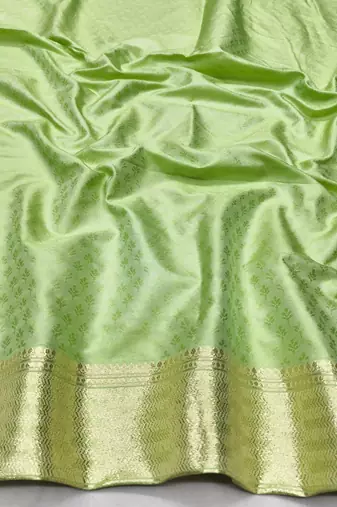 Light green zari woven banarasi silk traditional saree with blouse piece