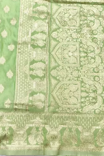 Light green zari woven banarasi silk traditional saree with blouse piece
