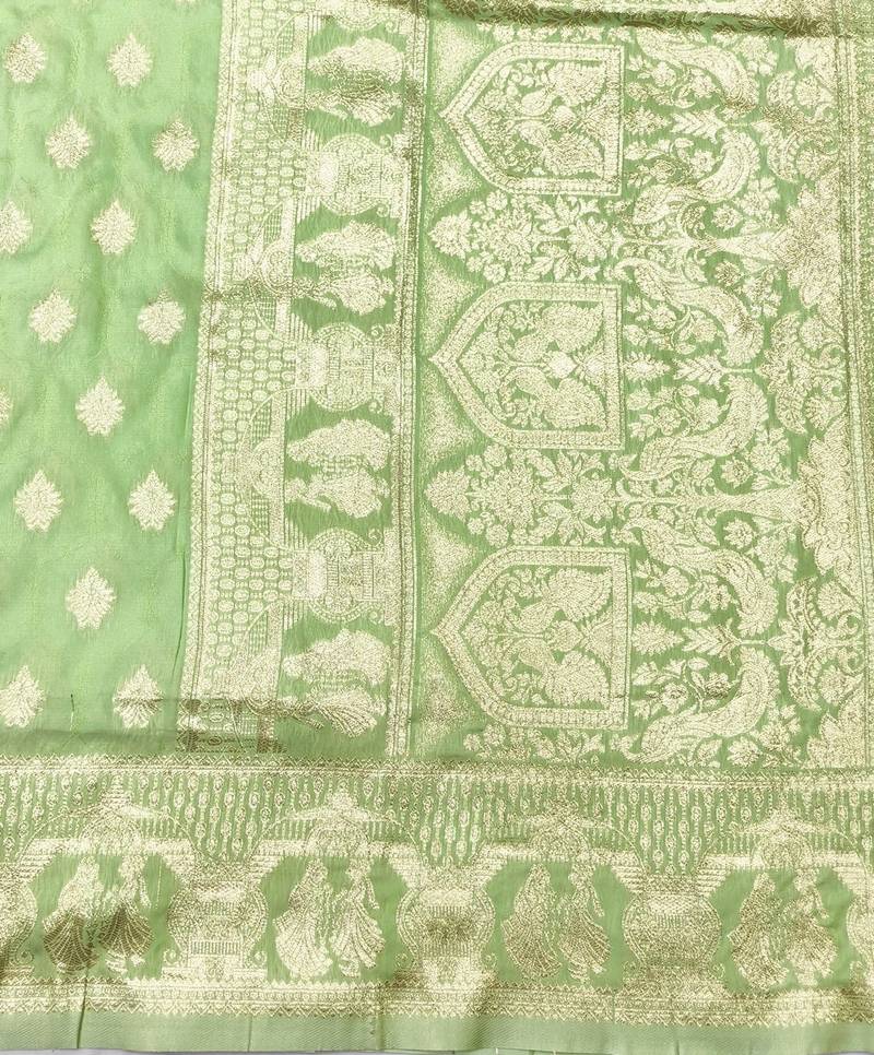Light green zari woven banarasi silk traditional saree with blouse piece