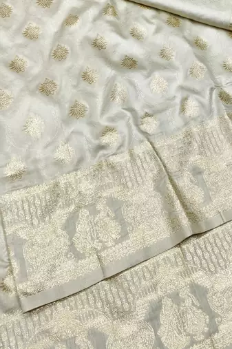 Cream zari woven banarasi silk traditional saree with blouse piece