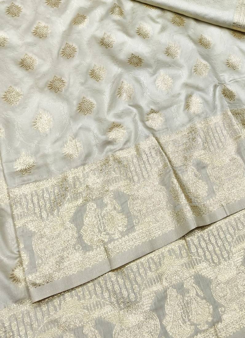 Cream zari woven banarasi silk traditional saree with blouse piece