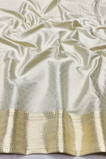 Cream zari woven banarasi silk traditional saree with blouse piece