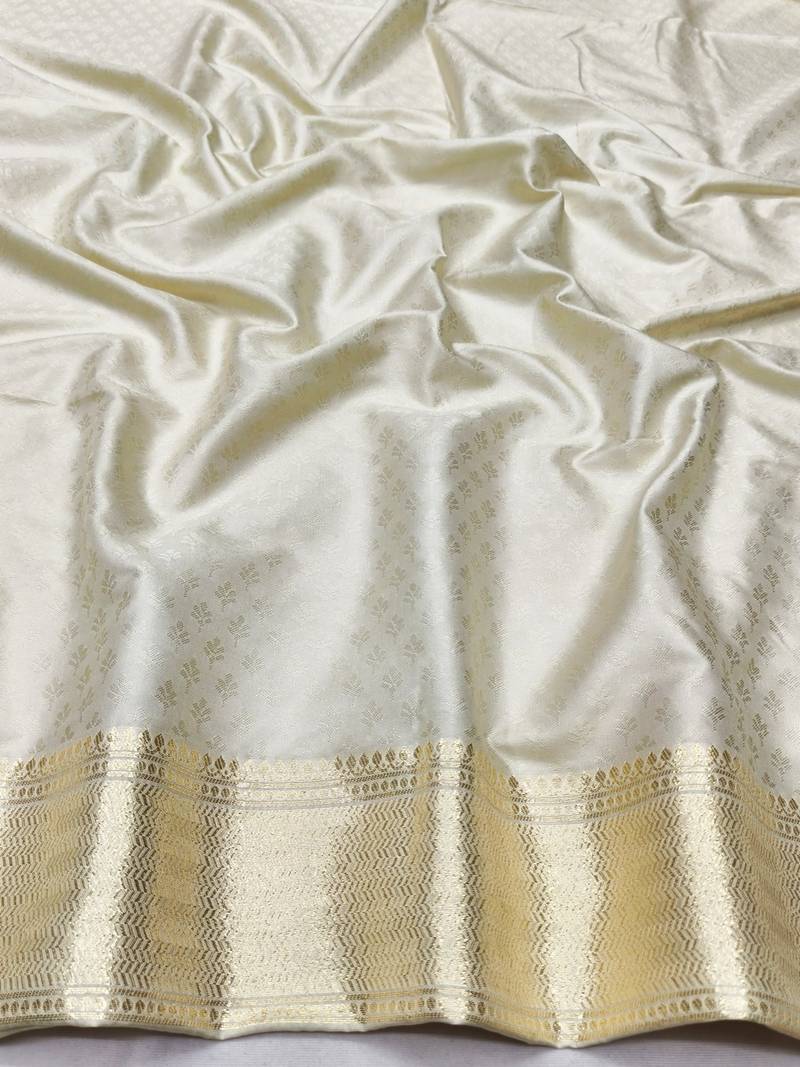 Cream zari woven banarasi silk traditional saree with blouse piece