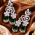 Emerald Petal Cascade Diamond Earrings