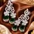 Emerald Petal Cascade Diamond Earrings