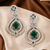 Emerald diamond halo drop earrings