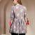 Sky-blue floral printed cotton flared top for women