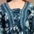 Sky-blue floral printed cotton flared top for women