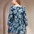Sky-blue floral printed cotton flared top for women