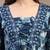 Sky-blue floral printed cotton flared top for women