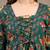 Green floral printed cotton flared top for women