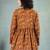 Brown floral printed cotton flared top for women