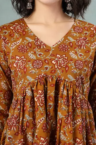 Brown floral printed cotton flared top for women