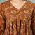 Brown floral printed cotton flared top for women