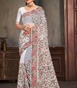 White sequin zari embroidered work net saree with unstitch blouse piece