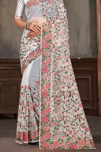 White sequin zari embroidered work net saree with unstitch blouse piece