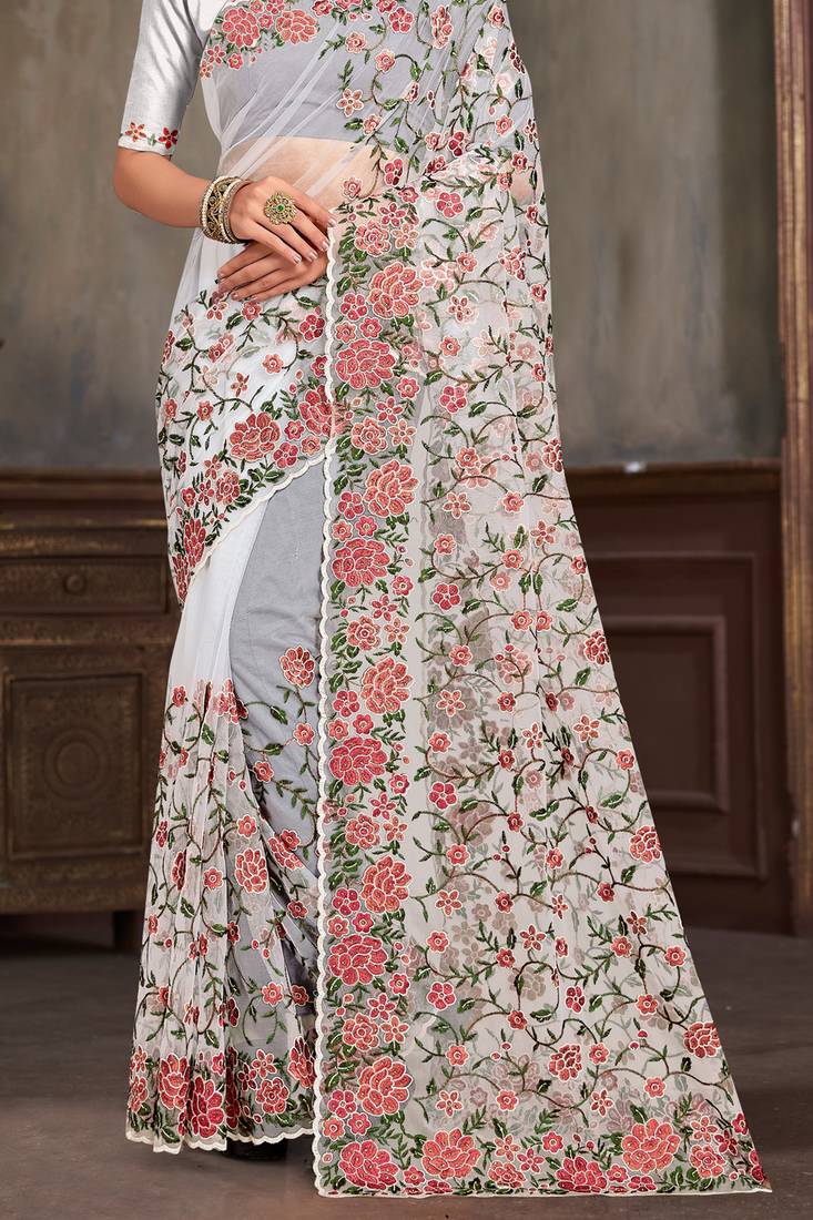 White sequin zari embroidered work net saree with unstitch blouse piece
