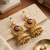 gold-plated antique matte chandbali kashmiri earrings with red and green multi-stones