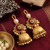 gold-plated antique matte chandbali kashmiri earrings with red stones