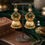 gold-plated antique matte chandbali kashmiri earrings with green stones