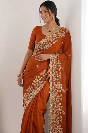 Rust colour party wear rangoli silk embroidered saree
