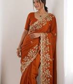 Rust colour party wear rangoli silk embroidered saree