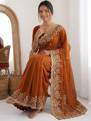 Rust colour party wear rangoli silk embroidered saree 2