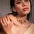 gold alloy necklace with pearl floral link design