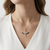 925 Sterling Silver Rose Gold Plated Winged Cross Pendant Necklace with Black & White Cubic Zirconia