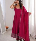 Graceful rani pink Silk blend anarkali gown with embroidered border and matching dupatta
