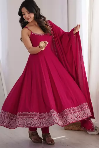 Graceful rani pink Silk blend anarkali gown with embroidered border and matching dupatta