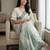 Sage green pre stitched floral linen saree