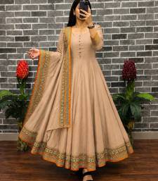 New trendy stylish cream solid anarkali kurta with traditional golden border dupatta set