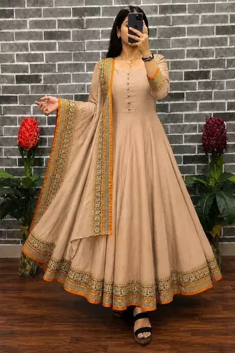 New trendy stylish cream solid anarkali kurta with traditional golden border dupatta set
