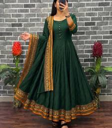 New trendy stylish green  solid anarkali kurta with traditional golden border dupatta set